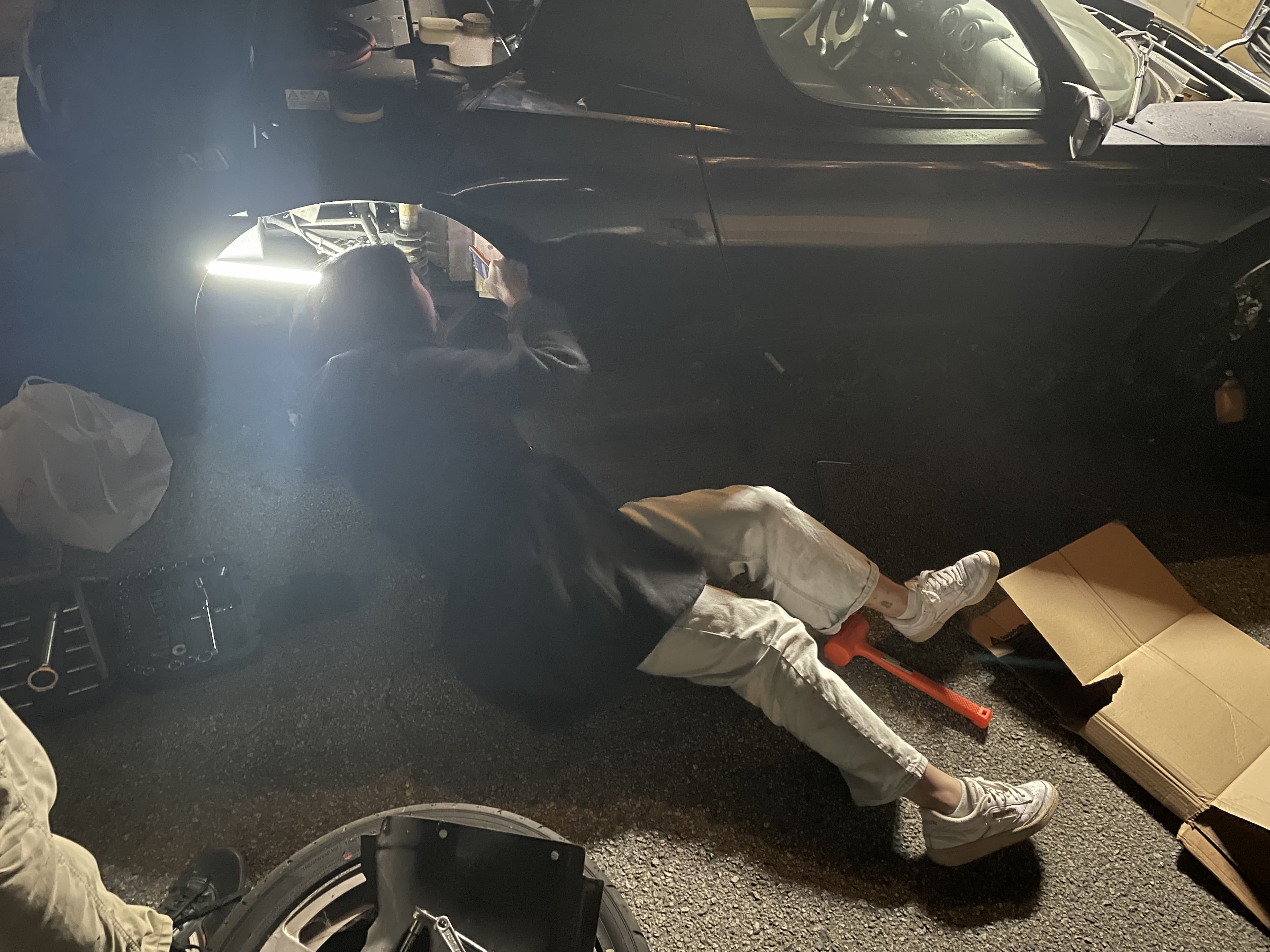 Working on the Tesla Roadster in the garage